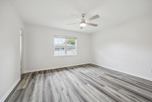 6451 Olympia Dr Unit 96, Houston, TX 77057 - spare room with a ceiling fan and wood finished floors
