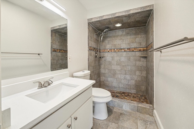 6451 Olympia Dr Unit 96, Houston, TX 77057 - full bathroom with vanity, a tile shower, and stone finish flooring