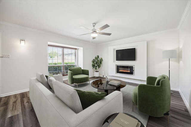 6451 Olympia Dr Unit 96, Houston, TX 77057 - living area featuring crown molding, dark wood-style flooring, a glass covered fireplace, and a ceiling fan