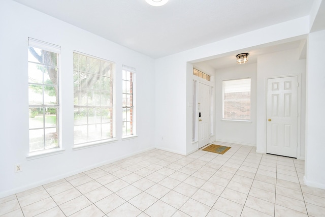 9338 Corner Oak Ln, Houston, TX 77036 - unfurnished room featuring light tile patterned flooring and baseboards