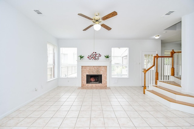 9338 Corner Oak Ln, Houston, TX 77036 - unfurnished living room with ceiling fan, stairway, and a fireplace