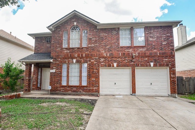 9338 Corner Oak Ln, Houston, TX 77036 - traditional-style house with a garage, concrete driveway, and brick siding