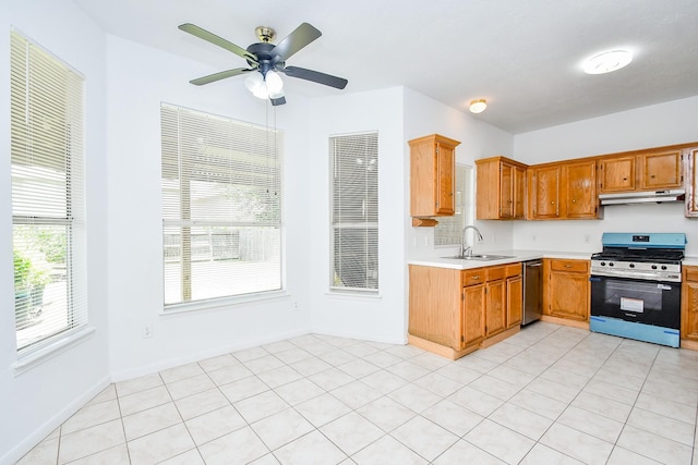 9338 Corner Oak Ln, Houston, TX 77036 - kitchen featuring appliances with stainless steel finishes, light countertops, under cabinet range hood, a ceiling fan, and brown cabinets