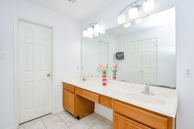9338 Corner Oak Ln, Houston, TX 77036 - bathroom with double vanity and tile patterned flooring