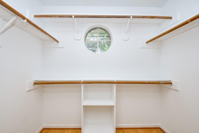 9338 Corner Oak Ln, Houston, TX 77036 - spacious closet featuring light wood-type flooring