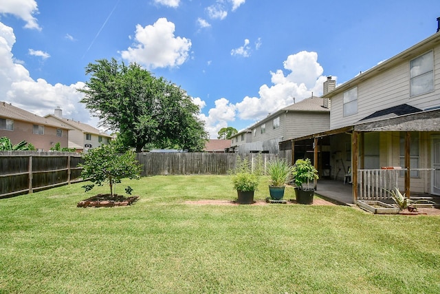9338 Corner Oak Ln, Houston, TX 77036 - fenced backyard featuring a patio area and a residential view