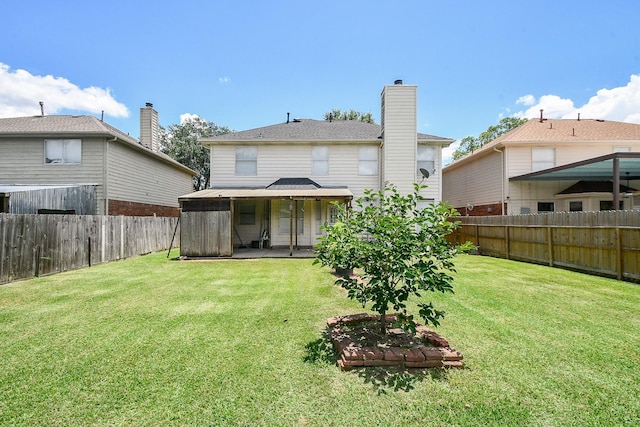 9338 Corner Oak Ln, Houston, TX 77036 - rear view of property with a fenced backyard