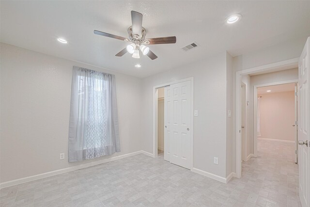 530 Frankie St Unit 1, Houston, TX 77015 - unfurnished bedroom with recessed lighting, a closet, ceiling fan, and light floors