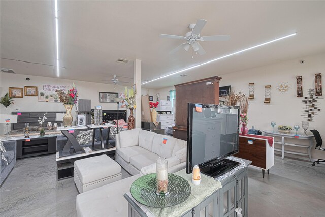 530 Frankie St Unit 1, Houston, TX 77015 - living room featuring ceiling fan and finished concrete flooring