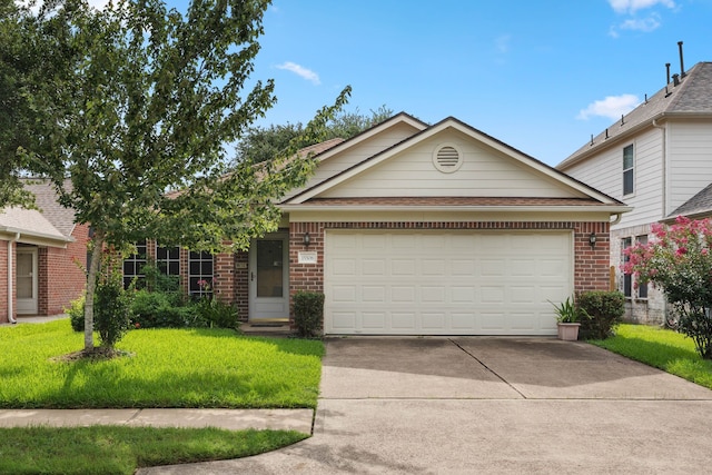 15506 Elm Leaf Pl, Cypress, TX 77429 - view of front of home featuring driveway, brick siding, a garage, and a front yard