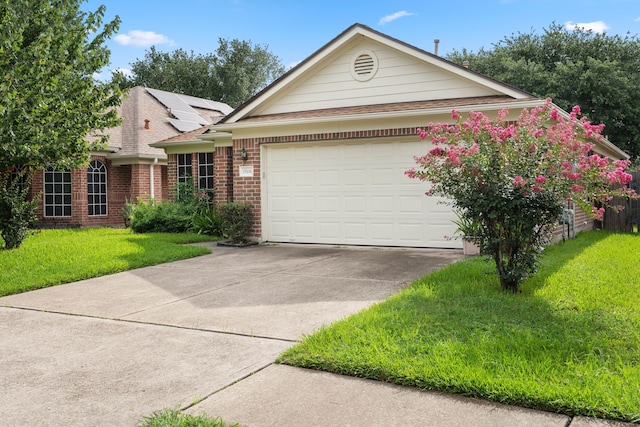 15506 Elm Leaf Pl, Cypress, TX 77429 - single story home with concrete driveway, an attached garage, a front yard, brick siding, and roof with shingles