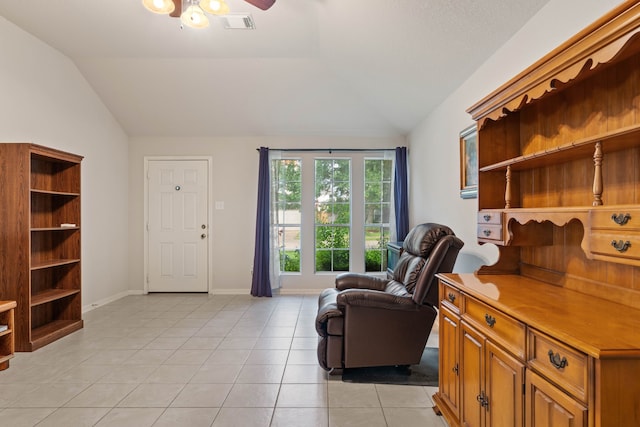 15506 Elm Leaf Pl, Cypress, TX 77429 - living area with vaulted ceiling, light tile patterned floors, and ceiling fan