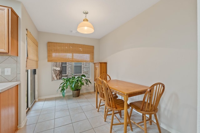 15506 Elm Leaf Pl, Cypress, TX 77429 - dining space with light tile patterned flooring and baseboards