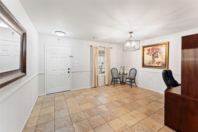 2830 Katybriar Ln, Katy, TX 77449 - entryway with a chandelier and light tile patterned flooring