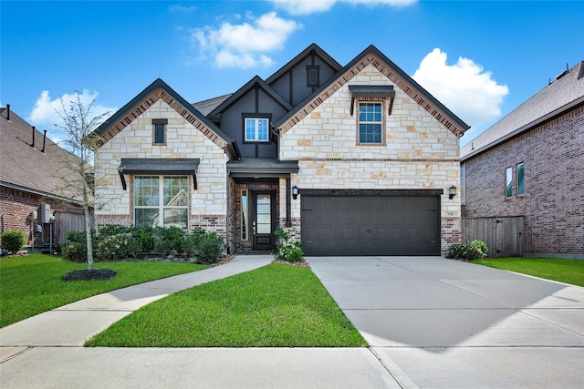 3310 Bellwick Chase Ln, Houston, TX 77365 - view of front of home with concrete driveway, a garage, stone siding, and stucco siding