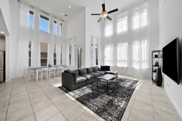 3310 Bellwick Chase Ln, Houston, TX 77365 - living area with ceiling fan, light tile patterned flooring, and a high ceiling