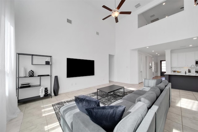 3310 Bellwick Chase Ln, Houston, TX 77365 - living area featuring a high ceiling, a ceiling fan, light tile patterned flooring, and recessed lighting