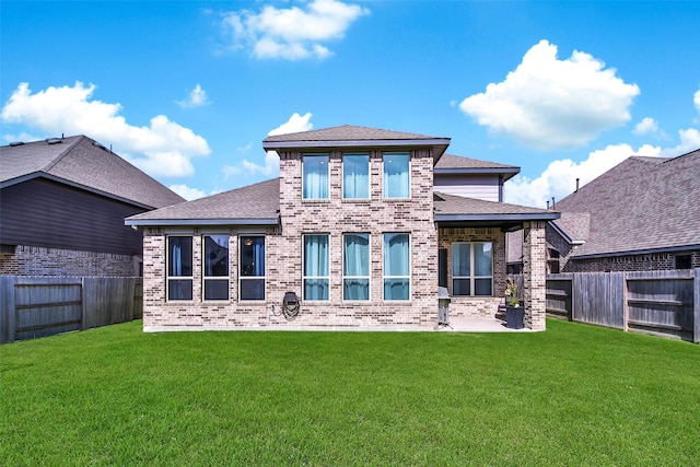 3310 Bellwick Chase Ln, Houston, TX 77365 - rear view of property with brick siding, a fenced backyard, a patio, and a shingled roof