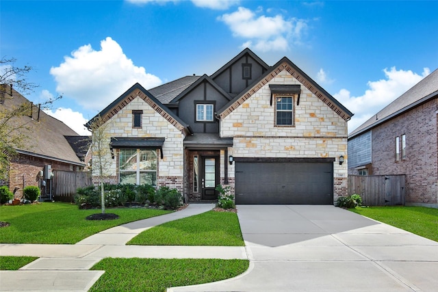 3310 Bellwick Chase Ln, Houston, TX 77365 - view of front facade featuring driveway, a garage, stone siding, and stucco siding