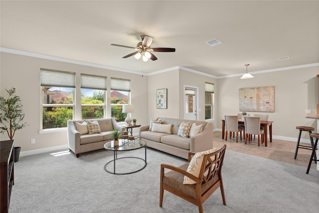 207 Cattle Ranch Dr, Richmond, TX 77469 - carpeted living room featuring a ceiling fan and crown molding