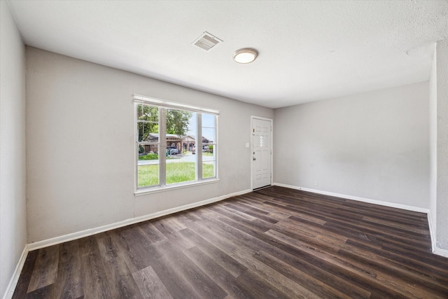 3209 Mccrarey Dr, Houston, TX 77088 - entrance foyer with dark wood finished floors and baseboards