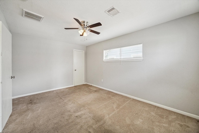 3209 Mccrarey Dr, Houston, TX 77088 - carpeted empty room featuring ceiling fan and baseboards