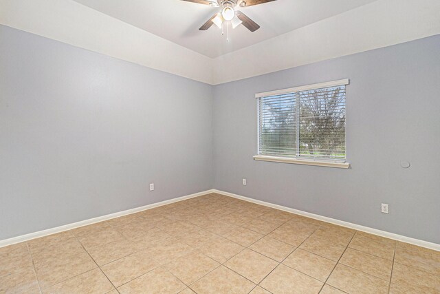 12222 Warrenwood Dr, Houston, TX 77066 - spare room with a ceiling fan and light tile patterned floors
