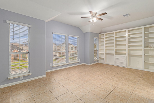 12222 Warrenwood Dr, Houston, TX 77066 - tiled spare room with ceiling fan and vaulted ceiling