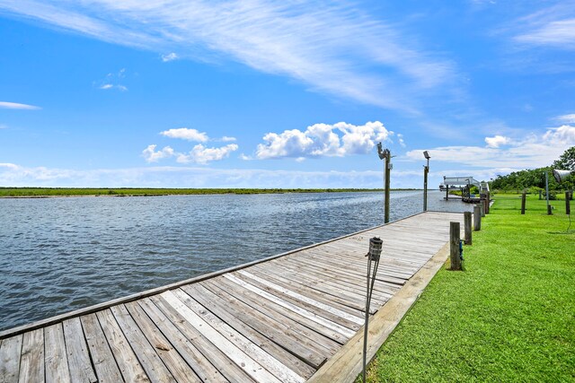10102 S Redfish Dr, Hitchcock, TX 77563 - dock area featuring a yard and a water view