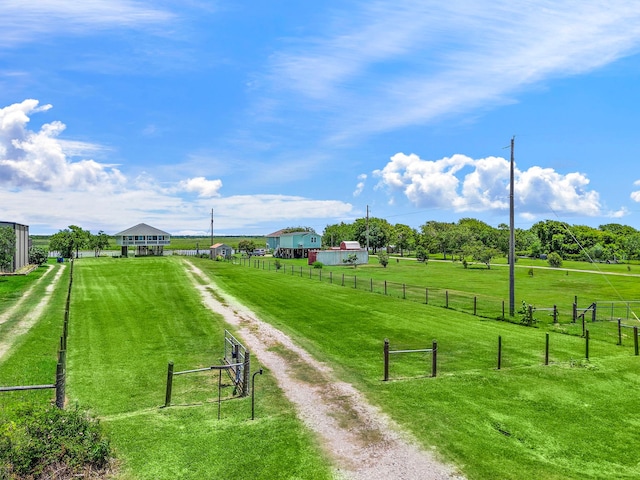 10102 S Redfish Dr, Hitchcock, TX 77563 - surrounding community featuring driveway and a view of rural / pastoral area