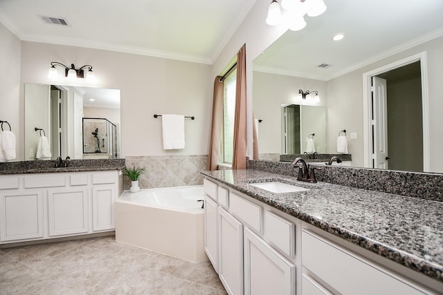 14618 Moccasin Ridge Dr, Cypress, TX 77433 - bathroom with a bath, two vanities, a shower stall, and crown molding