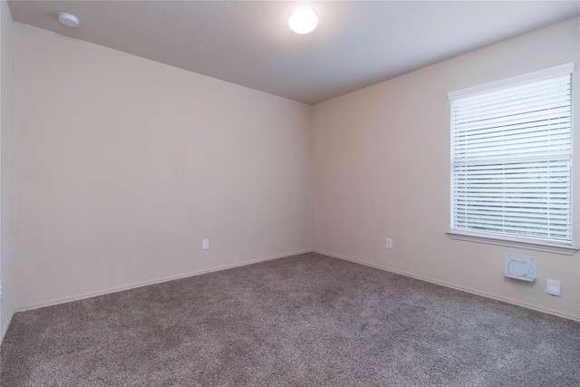 24423 Raindrop Poppy Dr, Spring, TX 77373 - carpeted empty room with a smoke detector and baseboards