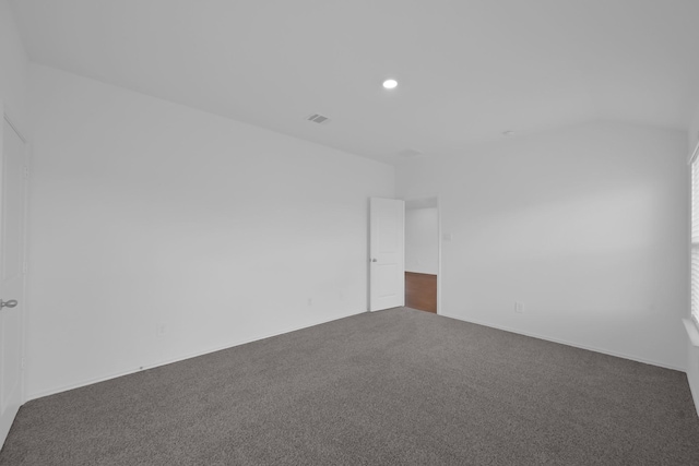 21391 Owl Rd, New Caney, TX 77357 - carpeted empty room with recessed lighting and lofted ceiling