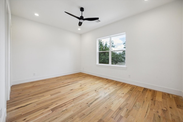 1419 Candlelight Ln, Houston, TX 77018 - unfurnished room with wood finished floors, ceiling fan, and recessed lighting