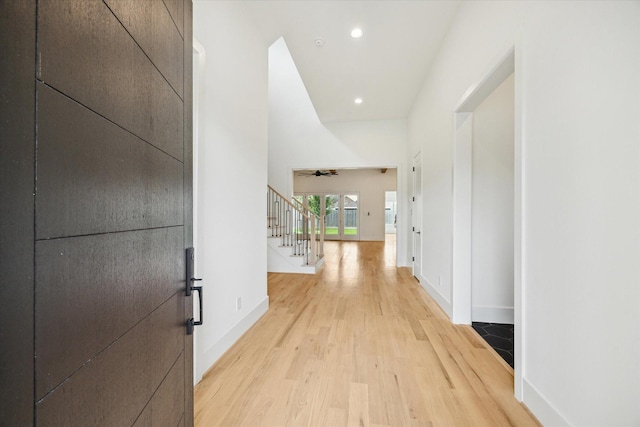 1419 Candlelight Ln, Houston, TX 77018 - hall featuring light wood-style floors, stairs, and recessed lighting