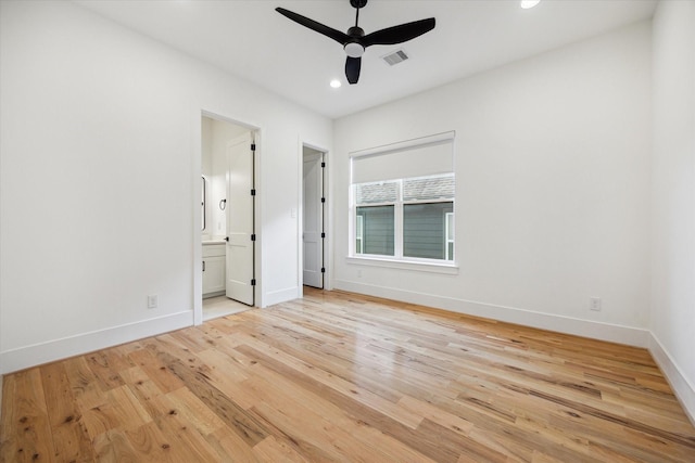 1419 Candlelight Ln, Houston, TX 77018 - unfurnished bedroom featuring wood finished floors, recessed lighting, connected bathroom, and a ceiling fan