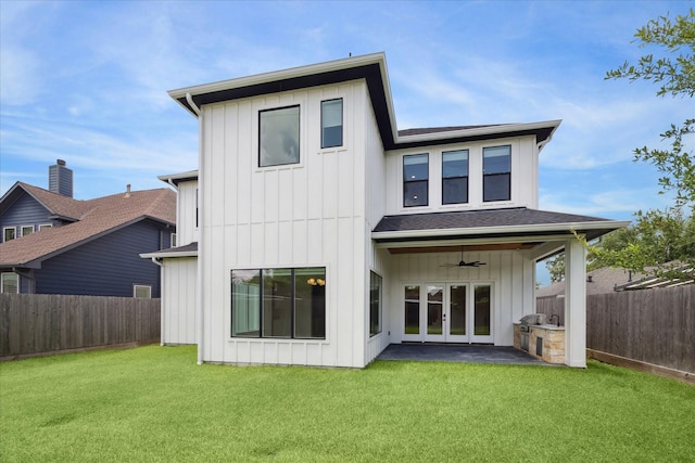 1419 Candlelight Ln, Houston, TX 77018 - rear view of property featuring a ceiling fan, a fenced backyard, french doors, and board and batten siding