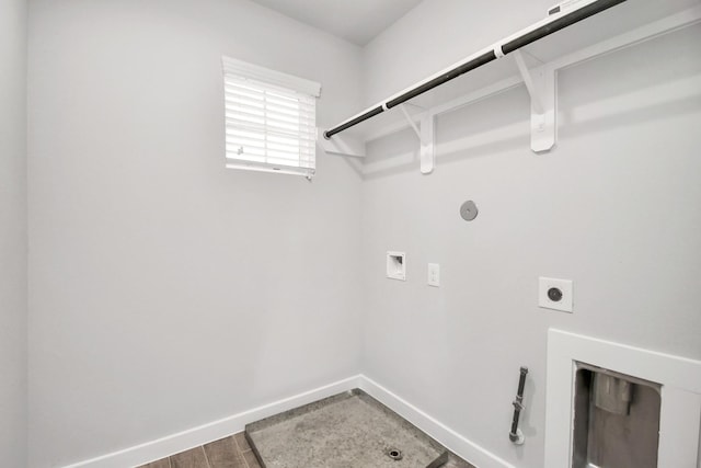 11106 Crocus Dr, Houston, TX 77044 - washroom featuring hookup for an electric dryer, hookup for a washing machine, and wood finished floors