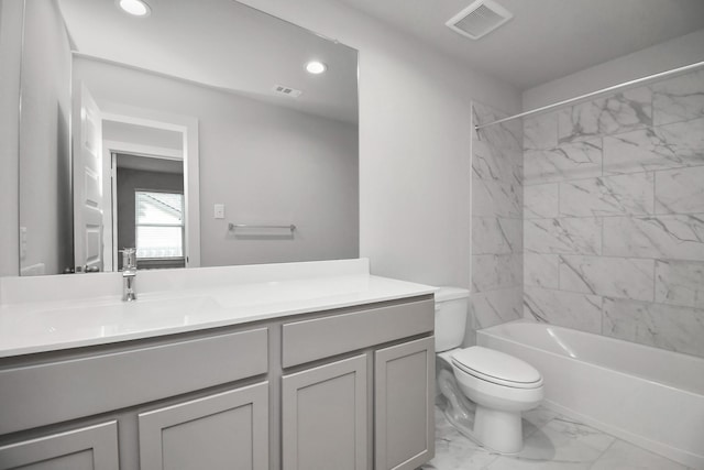 11106 Crocus Dr, Houston, TX 77044 - bathroom featuring vanity, marble look tiles, recessed lighting, and shower / bath combination