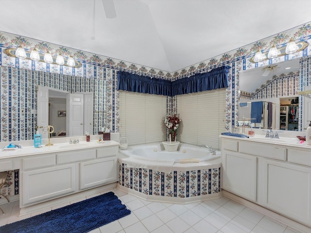 13410 Spyglen Ct, Cypress, TX 77429 - bathroom with wallpapered walls, a ceiling fan, two vanities, a garden tub, and vaulted ceiling