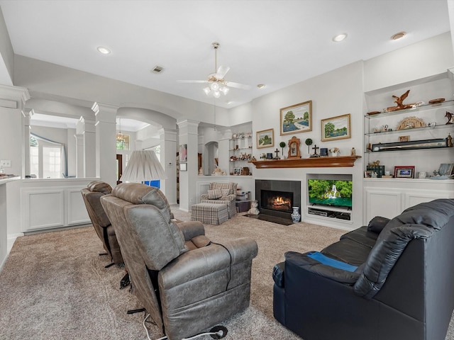 13410 Spyglen Ct, Cypress, TX 77429 - living room featuring ceiling fan, ornate columns, light carpet, a tile fireplace, and recessed lighting
