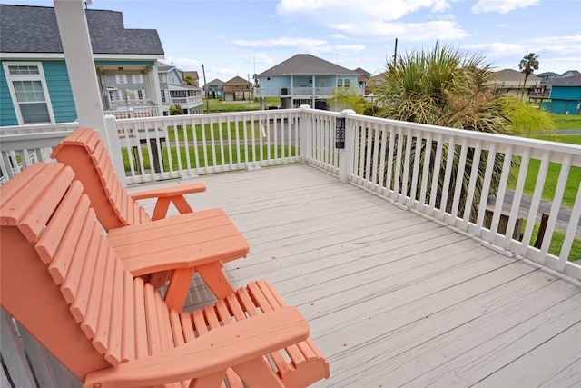 956 Biscayne, Crystal Beach, TX 77650 - deck featuring a residential view and a lawn