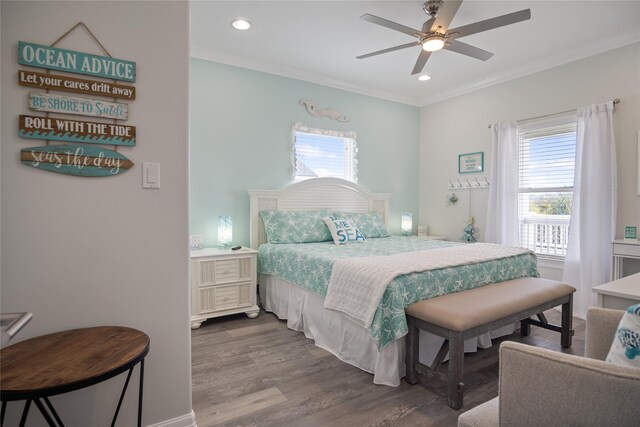 956 Biscayne, Crystal Beach, TX 77650 - bedroom with multiple windows, crown molding, dark wood finished floors, recessed lighting, and ceiling fan
