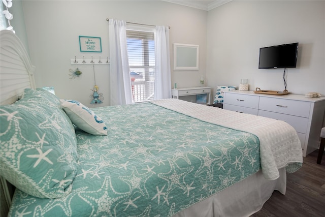 956 Biscayne, Crystal Beach, TX 77650 - bedroom featuring crown molding and dark wood-style flooring