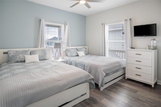 956 Biscayne, Crystal Beach, TX 77650 - bedroom featuring dark wood-style flooring and a ceiling fan