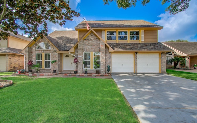 15731 Oak Mountain Dr, Houston, TX 77095 - view of front of home featuring driveway, a garage, a front yard, and brick siding