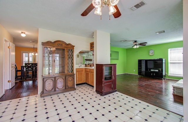 15731 Oak Mountain Dr, Houston, TX 77095 - kitchen with ceiling fan, open floor plan, a chandelier, and wood finished floors