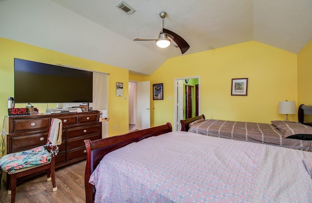 15731 Oak Mountain Dr, Houston, TX 77095 - bedroom featuring lofted ceiling, wood finished floors, and ceiling fan