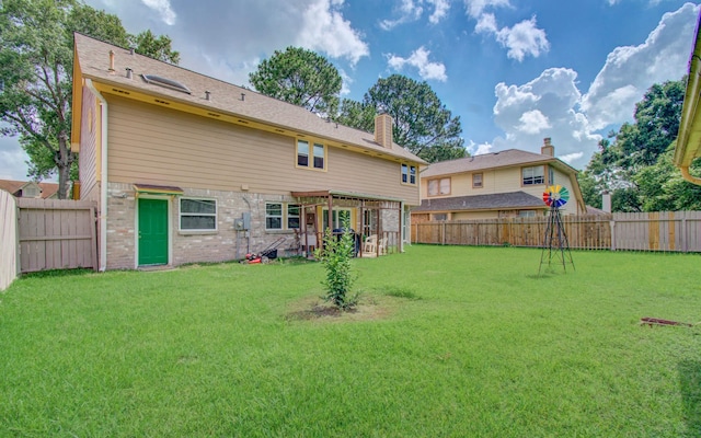 15731 Oak Mountain Dr, Houston, TX 77095 - rear view of house featuring a fenced backyard and a chimney