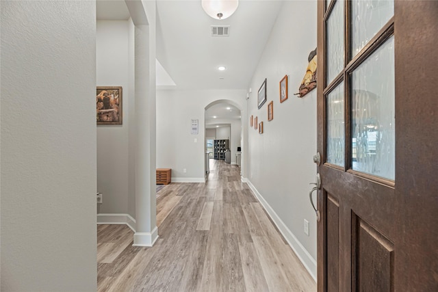 2922 Muhley St, Katy, TX 77493 - hall featuring arched walkways and light wood-type flooring